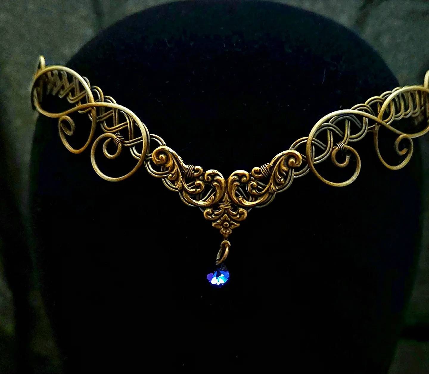 Brass gold medieval headpiece crown with a purple crystal