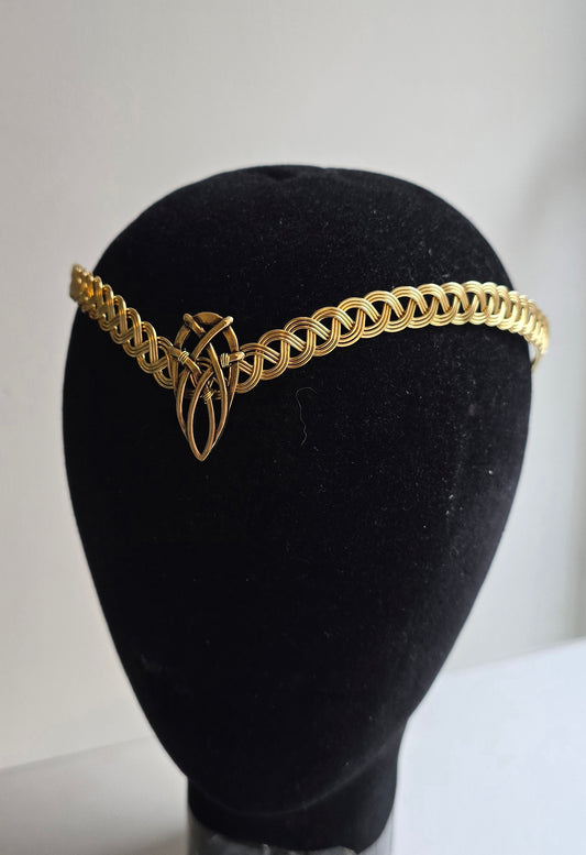 Antique gold-plated Celtic circlet with a V-shape forehead point and intricate knotwork setting, displayed on a black mannequin head.